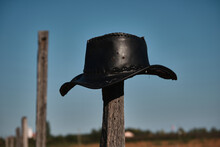Leather Hat On The Wooden Fence