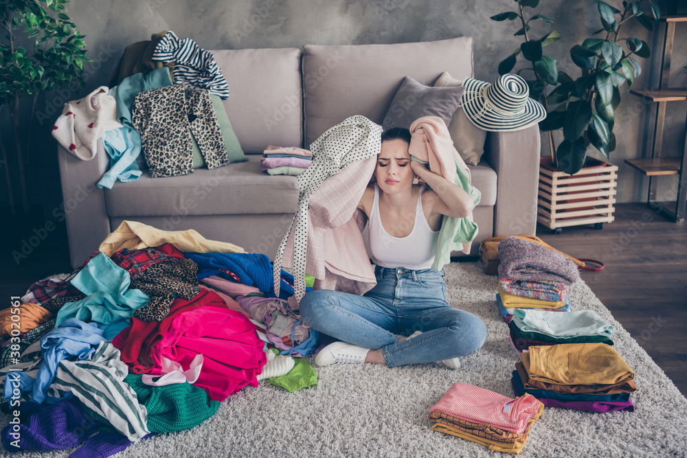 Photo of pretty stressed crying lady stay home quarantine many clothes heap stack floor wardrobe stuff pick select date outfit nothing to wear concept date preparation living room indoors - obrazy, fototapety, plakaty 
