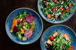 © zdenekdolezel - Three types of salads on a blue plates top view