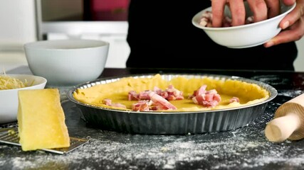 Wall Mural - man making quiche lorraine with egg, cream and cheese