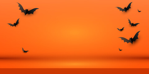 minimal creative orange background layout design with a flock of black paper bats. vector illustrati