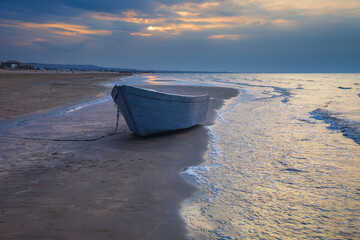 Fishing boat on the coast of the beach