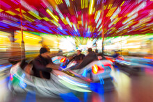 Motion Blurred Dodgems Or Bumper Cars At A Fun Fair