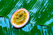 Ripe passion fruit, on a wet banana leaf. Vitamins, fruits, healthy foods