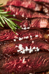 Wall Mural - Close up of grilled Medium Rare Ribeye steak with salt cristals