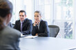 © Robert Daly/Caia Image - Corporate business people listening in conference room meeting