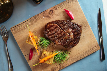 Wall Mural - Top view on grilled beef ribeye steak with potato