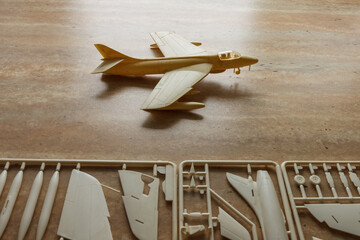 Scale model of the airplane fighter with details. Plastic assembly kit