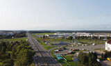 Fototapeta Do pokoju - Top view of the highway near the city with cars. 01 October 2020, Minsk Belarus