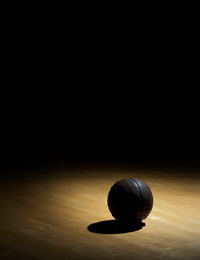 Wall Mural - Basketball On Hardwood Court Floor With Spot Lighting. Workout online concept. Long web banner copy space