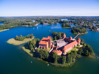 Poster - Aerial view of beautiful Gothic style red brick castle on an island on Galve Lake, Trakai, Lithuania