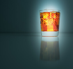 Wall Mural - Iced tea served in a glass isolated on dark background