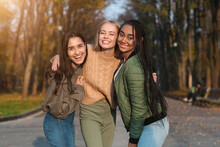 Trio Of Pretty Teen Girls Posing In Public Park