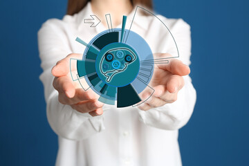 Poster - Woman demonstrating digital image of brain on blue background, closeup. Machine learning concept