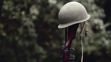 World War Era M1 Helmet And Rifle