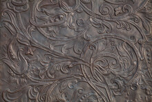 Background Image - A Floral Pattern In The Form Of Embossing On Metal