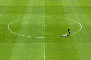 Painting line on a soccer pitch