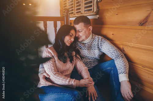 Cuadros en Lienzo The family celebrates Christmas together. A couple in love hugs