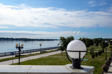 Round shiny lantern close-up. Bright summer day in the Strelka of Yaroslavl