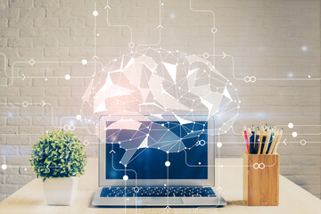 double exposure of desktop with computer and brain drawing hologram. artificial intelligence concept