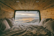 © Cavan Images - Views of sunset from open doors of sprinter van in Baja, Mexico.