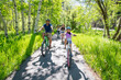 © Cavan Images - A family enjoys a bike ride on a bike path in South Lake Tahoe, CA