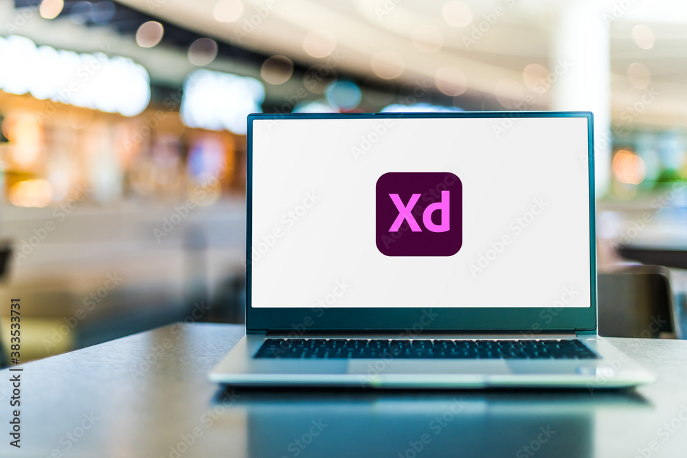 Xd Computer Laptop computer displaying logo of Adobe XD Stock Photo | Adobe Stock