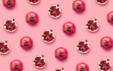 Wall Mural - Pattern of fresh pomegranates on pink background