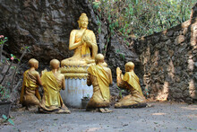 Statues Of Buddha And Buddhist Monks At Mount Phousi In Luang Prabang (laos)
