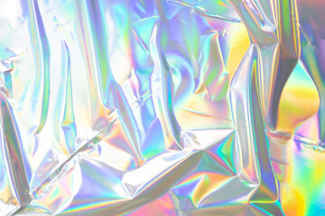 Poster - glued colorful holographic background. modern rainbow foil for texture, cover, wallpaper, print, dll
