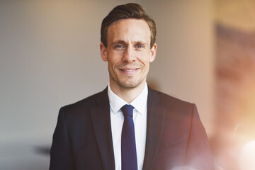 Wall Mural - Businessman standing in an office