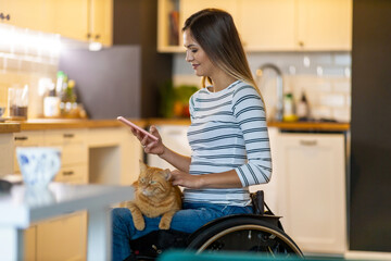 Woman In Wheelchair on Smartphone At Home
