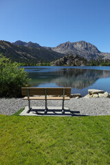 Wall Mural - Cosy bench on the shore