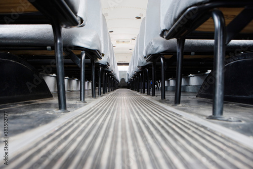 Fotografía Aisle between seats in empty school bus