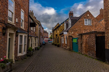 A View Down A Cobbled Street In Melton Mowbray, Leicestershire, UK In The Summertime