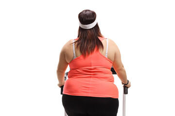 Poster - Rar view of an overweight woman on a treadmill