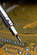 Soldering Of Electronic Circuit Board With Electronic Components.  Engineers Repair Circuit Board With Soldering Iron.