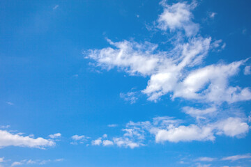 Clear blue sky and white clouds.