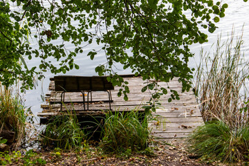 old wooden bench on the boardwalk