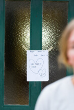 Child's Handwritten Poster On Door