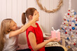 © Alexander - Mother and daughter with a New Year's gift