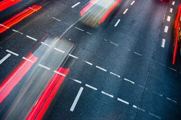 Poster - Motion blurred city road traffic (color toned  image)