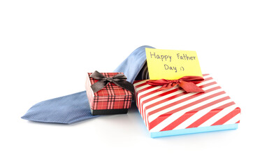 tie and two gift boxes with card tag write happy father day word