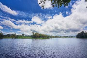 Wall Mural - Countryside blue sky and lake in daytime of thailand