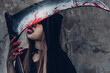 © sorapop - Woman ghost horror her have tongue lick scythe, halloween day concept