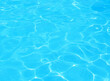 © SappawatS - Surface of blue swimming pool, background of water in swimming pool. Abstract beautiful ripple wave and clear turquoise water surface in swimming pool, Turquoise or blue water wave for background