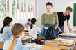 © JackF - Girls and boys are preparing for lecture in the classroom.