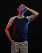 © AndhikaRaya - Young men in empty navy blue T-shirts and wearing health masks, dress up and pose like famous T-shirt models. Men's t-shirt template and mockup design for print.