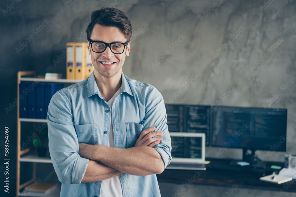 Close-up portrait of his he nice attractive cheerful cheery geek guy digital security top manager folded arms career growth at modern industrial interior style concrete wall work place station - obrazy, fototapety, plakaty 