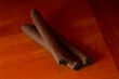 Three cigars on a table